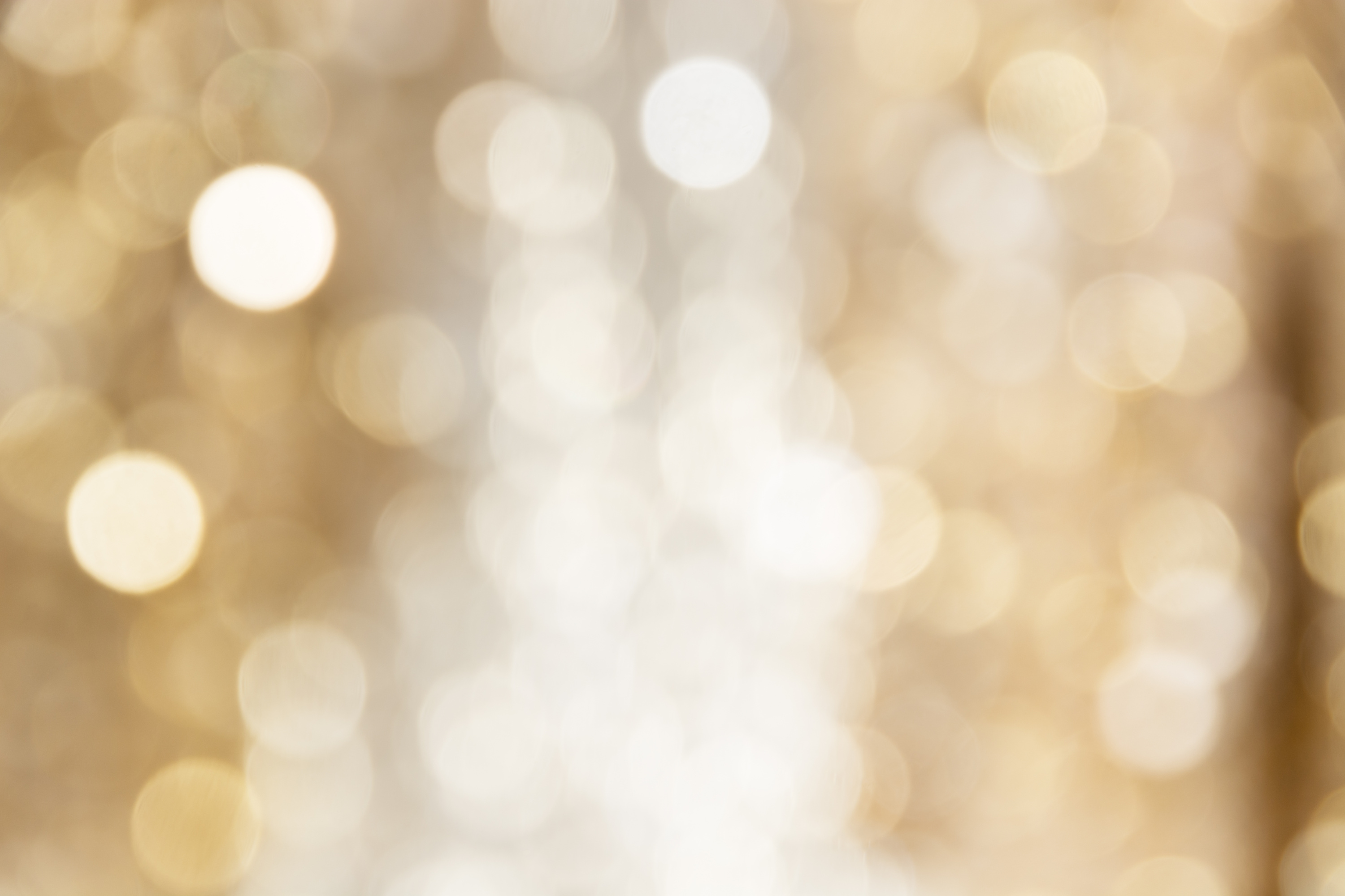 Defocused sparkly gold and silver background.